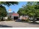 Well-maintained clubhouse with manicured landscaping and ample parking, perfect for community events and gatherings at 9136 Palm Bay Cir, Raleigh, NC 27617