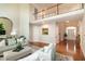 Spacious living area with high ceilings, hardwood floors, and staircase at 9136 Palm Bay Cir, Raleigh, NC 27617