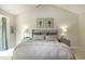 Cozy main bedroom with neutral walls, carpet, and large window with bright natural light at 9136 Palm Bay Cir, Raleigh, NC 27617