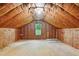 Bright unfinished attic space featuring natural lighting, insulation and unfinished walls, ready for customization at 9257 Sauls Rd, Raleigh, NC 27603