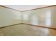 Spacious bedroom with neutral paint, carpet, and trim at 9257 Sauls Rd, Raleigh, NC 27603