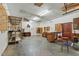 Spacious garage with storage cabinets, work benches, and concrete floors at 9257 Sauls Rd, Raleigh, NC 27603