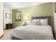 Comfortable bedroom showcases a serene atmosphere and neutral color palette at 9507 Sertoma Rd, Chapel Hill, NC 27516