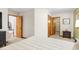 Spacious bedroom with a glimpse into the ensuite bathroom and living area at 9507 Sertoma Rd, Chapel Hill, NC 27516