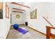 Bright bonus room with natural lighting, exposed beams, octagon window, and carpeted flooring at 9507 Sertoma Rd, Chapel Hill, NC 27516