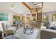 Cozy living room with modern decor, loft access, and dining area at 9507 Sertoma Rd, Chapel Hill, NC 27516