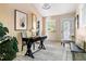 Bright home office featuring a functional workspace and cozy seating area at 9507 Sertoma Rd, Chapel Hill, NC 27516