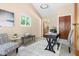 Cozy home office features ample natural light and functional workspace at 9507 Sertoma Rd, Chapel Hill, NC 27516