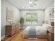 Cozy, staged bedroom featuring hardwood floors, and calm artwork, perfect for relaxing at 95113 Vance Knls, Chapel Hill, NC 27517