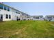 Manicured lawn with fences and a view of the house at 97 Begonia St, Angier, NC 27501