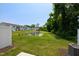 Backyard with pond and view of back of the house at 97 Begonia St, Angier, NC 27501