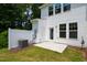 View of backyard patio, siding, and fence creating a private outdoor space at 97 Begonia St, Angier, NC 27501