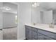 Bathroom vanity with double sinks, modern fixtures and ample counter space at 98 Priming Way, Angier, NC 27501