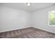 Bedroom with neutral carpet and a window providing natural light at 98 Priming Way, Angier, NC 27501