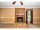 A beautiful fireplace with hearth is the focal point in this room at 1006 Apache Ln, Apex, NC 27502