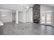 Expansive living room featuring a stone fireplace, vaulted ceilings, and an open layout at 1041 Bonanza Ln # 37, Mebane, NC 27302