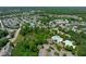 A high angle view of the community near a beautiful pond surrounded by lush trees at 105 Bridgegate Dr, Cary, NC 27519