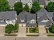 Aerial view of a charming home with a well-manicured front yard at 105 Bridgegate Dr, Cary, NC 27519