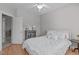 Bedroom with hardwood floors, neutral decor and lots of natural light at 105 Bridgegate Dr, Cary, NC 27519