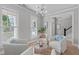 Cozy living room with comfortable seating, natural light, hardwood floors, and stylish decor at 105 Bridgegate Dr, Cary, NC 27519