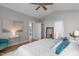 Bedroom with hardwood floors, neutral decor, and ensuite bathroom at 105 Bridgegate Dr, Cary, NC 27519