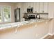 Bright kitchen featuring stainless steel appliances, granite countertops, and ample cabinet space at 105 Old Dock Trl, Cary, NC 27519