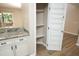 Open pantry with adjustable shelves and a door organizer enhances this kitchen at 105 Old Dock Trl, Cary, NC 27519
