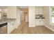 Bright kitchen showcasing granite countertops, stainless steel appliances, and modern cabinetry at 105 Old Dock Trl, Cary, NC 27519
