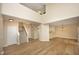 Bright, open-concept living space with hardwood floors, high ceilings, and seamless flow to the kitchen area at 105 Old Dock Trl, Cary, NC 27519