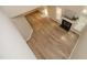 Spacious living room featuring wood flooring, natural light, and a cozy fireplace at 105 Old Dock Trl, Cary, NC 27519