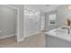 Modern main bathroom featuring a glass shower, quartz countertop, and tile floors at 109 Crested Coral Dr, Holly Springs, NC 27540