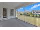 Spacious screened-in porch with an access door and backyard views at 109 Crested Coral Dr, Holly Springs, NC 27540