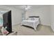 Cozy bedroom with neutral colors, large bed, and soft carpet at 111 Ferncroft Ct, Cary, NC 27519