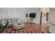 Spacious living room featuring hardwood floors and neutral decor at 111 Ferncroft Ct, Cary, NC 27519