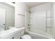 Bathroom featuring white fixtures, vanity, and a shower-tub combination at 1110 Allgood St, Durham, NC 27704