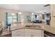 Spacious kitchen with granite countertops and stainless appliances, offering a clear view to the living spaces at 1161 Tulip Poplar Rd, Fuquay Varina, NC 27526