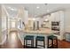 Modern kitchen with granite counters, stainless appliances, and an island with seating, perfect for entertaining at 1161 Tulip Poplar Rd, Fuquay Varina, NC 27526