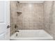 Bathroom with neutral tile surround, and a soaking tub at 1177 Sun Springs Rd, Wake Forest, NC 27587