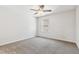 Bedroom featuring neutral carpet, ceiling fan, and bright window at 1177 Sun Springs Rd, Wake Forest, NC 27587