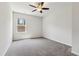 Cozy bedroom with neutral carpet, a window, and ample space for relaxation at 1177 Sun Springs Rd, Wake Forest, NC 27587