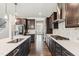Well-equipped kitchen with stainless steel appliances, an island, and sleek countertops at 1177 Sun Springs Rd, Wake Forest, NC 27587