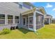 Charming screened porch and landscaped backyard at 1177 Sun Springs Rd, Wake Forest, NC 27587