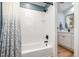 Modern bathroom features a shower/tub combo with subway tile and black fixtures at 119 Palace Grn, Cary, NC 27518