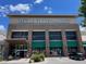 This commercial building features a stone facade, large windows, and convenient parking at 119 Palace Grn, Cary, NC 27518