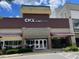 This commercial building boasts a stone facade, large windows, and easy access at 119 Palace Grn, Cary, NC 27518