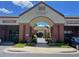 Lochmere Pavilion, a brick commercial building with archways and various storefronts in a well-maintained area at 119 Palace Grn, Cary, NC 27518