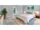 Well-lit main bedroom with neutral tones, plush carpet, and modern decor at 119 Palace Grn, Cary, NC 27518