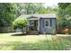 Charming cottage-style home with a welcoming front porch and well-maintained landscaping at 120 Pine St, Carrboro, NC 27510