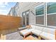 Cozy deck with comfortable outdoor seating and privacy screens, ideal for relaxation at 1203 Corkery Ridge Ct, Cary, NC 27519