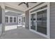 Covered porch area with screened windows and sliding glass door at 1217 Linkwood Way, Fuquay Varina, NC 27526